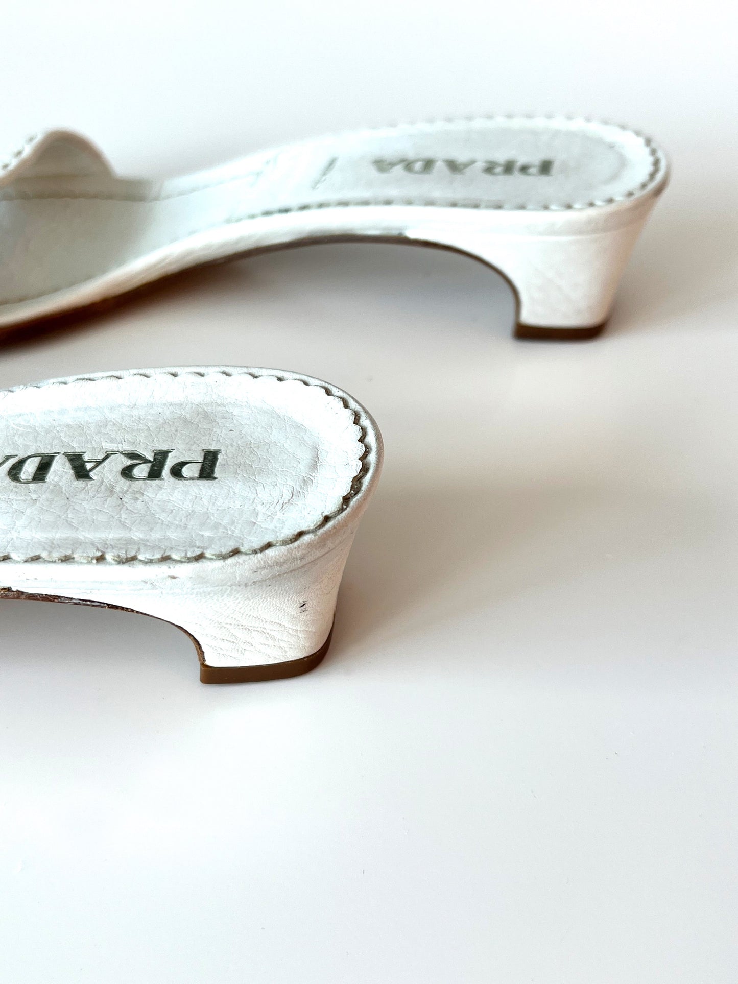 White Prada Logo Short Heel Mules (SOLD)